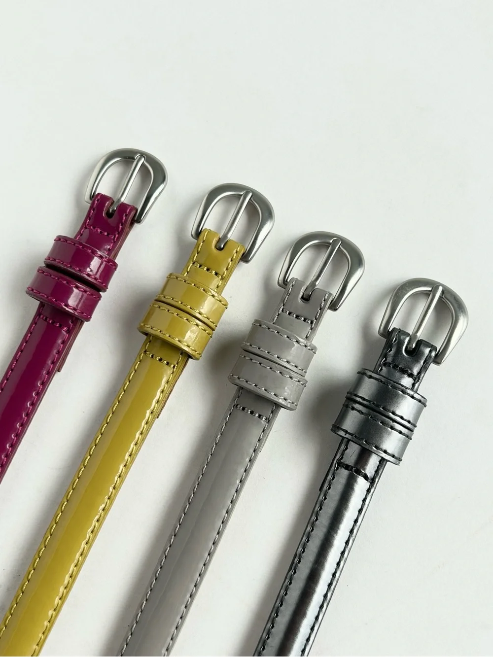 4 X Uniqlo lacquered leather skinny belt